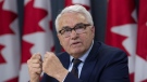 Official Languages Commissioner Raymond Theberge responds to a question during a news conference in Ottawa, Thursday May 9, 2019. THE CANADIAN PRESS/Adrian Wyld