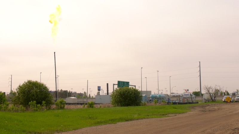 A giant flame is visible in Saskatoon on May 30, 2023 during routine SaskEnergy maintenance at one of its stations. (Dale Cooper/CTV News)