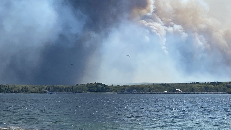 Smoke from a wildfire in Shelburne County, Nova Scotia, is pictured on May 30, 2023. (Valentine Kengbeza/CTV Atlantic)