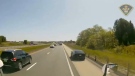 Dash cam video shows a vehicle driving on the shoulder of Highway 401 at a high rate of speed in Elgin County in May 2023. (Source: OPP West Region/Twitter)