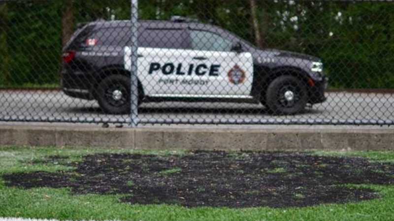 Police in Port Moody are asking the public for help tracking down "a group of youth" they say deliberately set several fires on an artificial turf field in the city last week. (Port Moody Police Department)