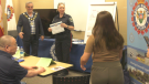 South Simcoe Police hand out certificates at Newcomers Academy in Bradford, Ont., on Tues., May 30, 2023. (CTV News/Ian Duffy)