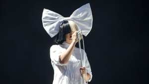 Sia performs at the V Festival in Hylands Park, Chelmsford, on  Aug 20, 2016. (Joel Ryan/Invision/AP, File) 