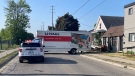 Police are investigating in the area surrounding a moving van after an incident Wednesday morning near Grey and Maitland streets. May 31, 2023. (Sean Irvine/CTV News London)