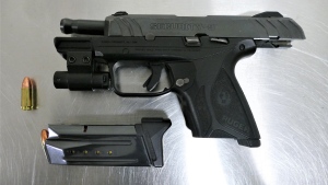 A firearm that was seized from a Richmond Hill home last week is shown. Police say that it was found wrapped in "a sweater, in a child’s bedroom closet, next to a crib." (York Regional Police)