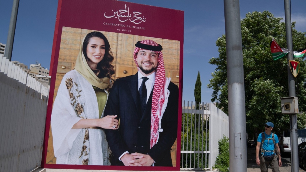 Crown Prince Hussein and Rajwa Alseif on a poster