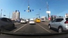 Dashcam video obtained by Reuters shows the moment falling weaponry misses a moving Kyiv car on May 29, 2023.