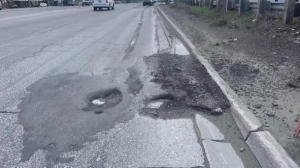 Potholes and patching on a northern road. (CTV Northern Ontario)