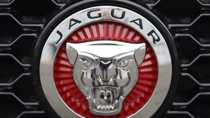 In this file photo dated Sunday, April 26, 2020, the Jaguar company logo is shown on the grille of an unsold 2020 F-Pace sports-utility vehicle at a Jaguar dealership in Littleton, Colo. Jaguar is recalling more than 6,000 I-Pace electric SUVs in the U.S., Wednesday, May 31, 2023, due to the risk of the high-voltage battery overheating and catching fire. The recall is the latest in a series of electric vehicle battery recalls because of possible fires.(AP Photo/David Zalubowski, FILE)