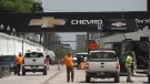 Construction crews rush to complete the Chevrolet Detroit Grand Prix IndyCar race track on May 31, 2023. (Rich Garton/CTV News Windsor)