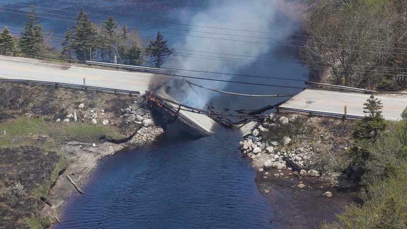 A bridge that collapsed in Shelburne County, Nova Scotia, because of a wildfire is pictured. (@nsgov/Twitter) 

