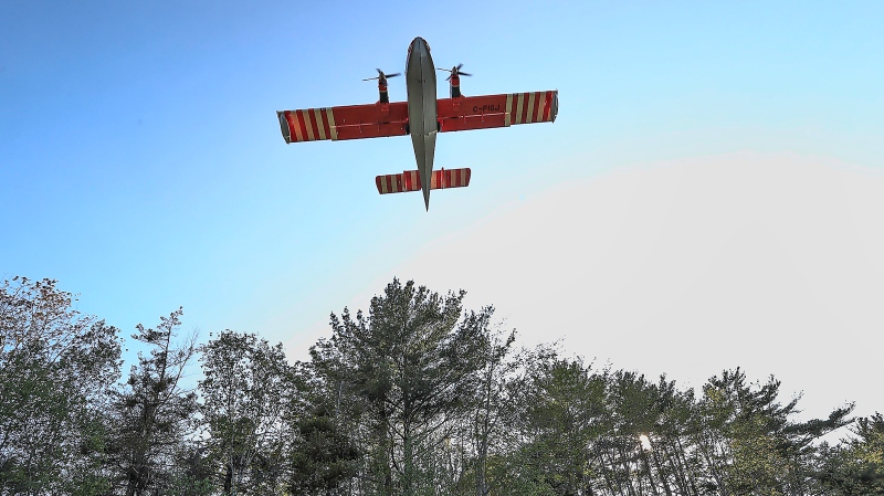 A water bomber flies overhead near Sandy Point, Shelburne County, on May 31, 2023. (Nova Scotia government) 