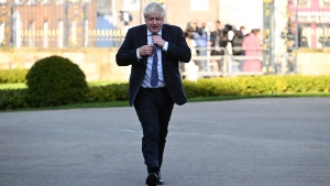 Former British Prime Minister Boris Johnson arrives at Hillsborough Castle in Belfast, on April 19, 2023. (Charles McQuillan / Pool Photo via AP) 