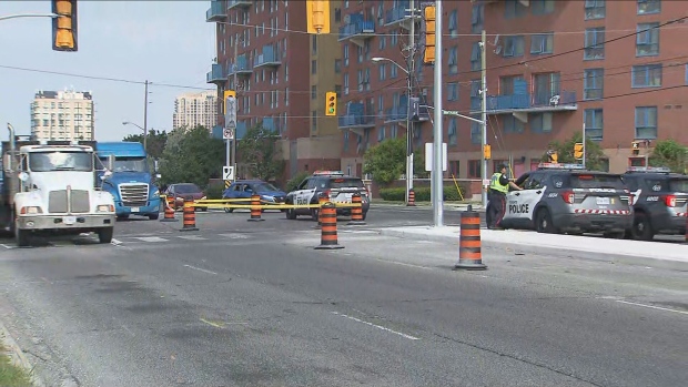 Police are shown at the scene after a teenaged girl was struck by a vehicle in Rexdale on Thursday morning. 