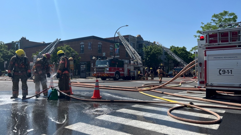 Firefighters in Montreal were forced to fight a fire in the middle of a heatwave on June 1, 2023. (Ken Dow/CTV News)