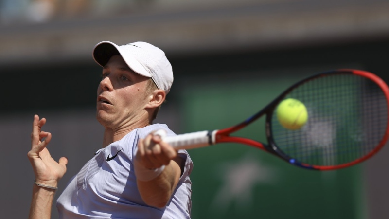 Canada's Denis Shapovalov plays a shot against Brandon Nakashima of the U.S. during their first round match of the French Open tennis tournament at the Roland Garros stadium in Paris, Monday, May 29, 2023. THE CANADIAN PRESS/AP-Aurelien Morissard