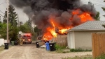 A double detached garage in southwest Calgary was destroyed in an intense fire on June 1, 2023. (Supplied/Kate Howden)