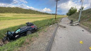 Mounties are investigating a serious crash on Highway 97 in Kelowna, B.C., that sent two people to hospital late Wednesday night (Photo: Castanet). 