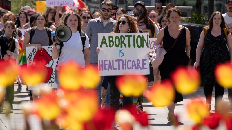 A survey shows there is some confusion about the options available in Canada to terminate a pregnancy. Pictured here, protesters for abortion make their way through the downtown core to Parliament Hill, Thursday, May 11, 2023 in Ottawa. THE CANADIAN PRESS/Adrian Wyld
