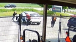Employees at Connect Equipment chase after the men who robbed their Kitchener store on May 31, 2023. (Video still)