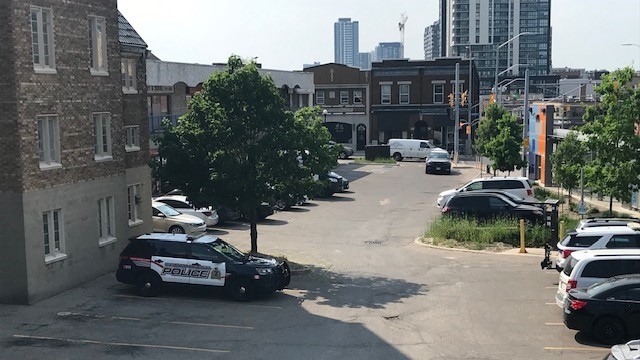 Waterloo regional police investigating a stabbing at Queen Street South and Charles Street West in Kitchener. (June 1, 2023)