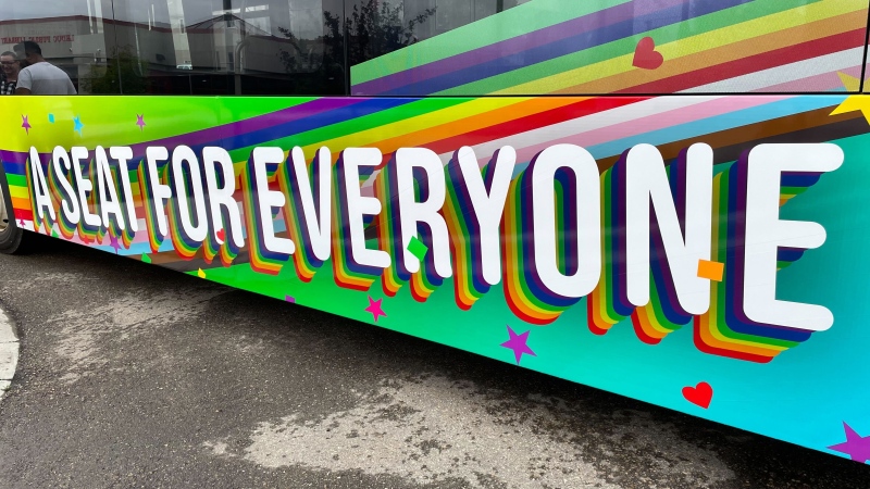 The City of Leduc unveiled a new Pride-themed bus wrap at a flag raising ceremony Thursday. (Sean McClune/CTV News Edmonton)