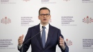 Poland's Prime Minister Mateusz Morawiecki speaks during a media conference during the European Political Community Summit at the Mimi Castle in Bulboaca, Moldova, Thursday, June 1, 2023. (THE CANADIAN PRESS/AP-Andreea Alexandru)