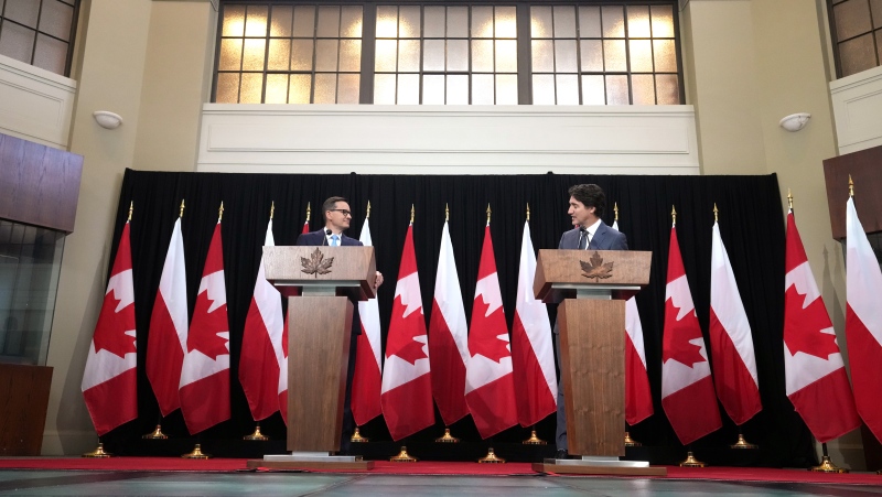 Prime Minister Justin Trudeau and Poland Prime Minister Mateusz Morawiecki make an announcement in Toronto on Friday, June 2, 2023. THE CANADIAN PRESS/Chris Young