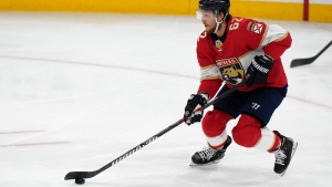 Florida Panthers defenseman Brandon Montour (62) skates with the puck during the first period of Game 4 of the NHL hockey Stanley Cup Eastern Conference finals against the Carolina Hurricanes, Wednesday, May 24, 2023, in Sunrise, Fla. (AP Photo/Lynne Sladky)