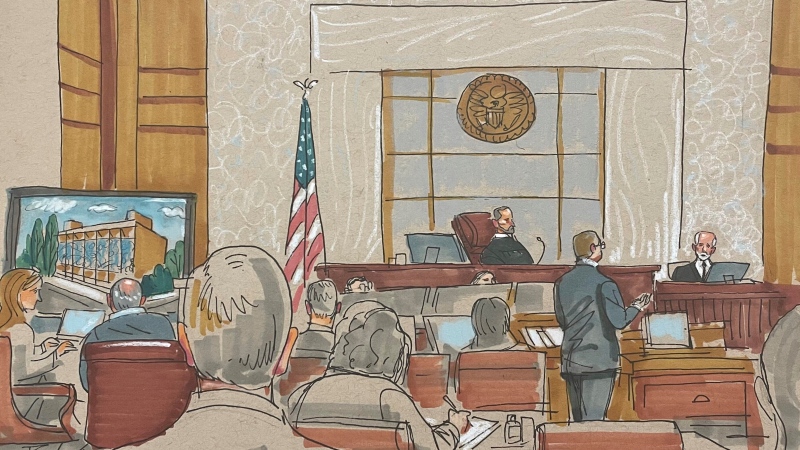 In this courtroom sketch, prosecuting attorney Eric G. Olshan questions witness Rabbi Jeffrey Myers of the Tree of Life Congregation, in the federal trial for 2018 synagogue massacre suspect Robert Bowers, on Tuesday, May 30, 2023. (David Klug via AP)