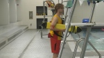 A lifeguard stands at the pool in the Orillia Recreational Centre on Fri., June 2, 2023. (CTV News/Molly Frommer)