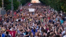 People march during a protest against violence in Belgrade, Serbia, June 3, 2023. (AP Photo/Darko Vojinovic)