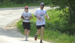 Chelsea LeBlanc and Tyler Hergott run 10 km in 50 km triathlon for Amelia Rising Sexual Violence Support Centre in North Bay. June 4/23 (Eric Taschner/CTV Northern Ontario)