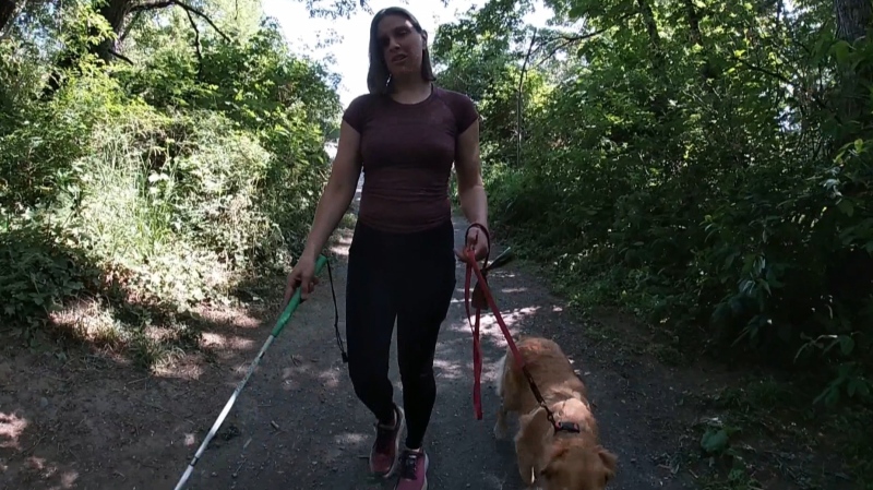 Jessica Tuomela and her guide dog