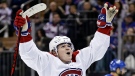 Montreal Canadiens right wing Cole Caufield reacts after scoring a goal against the New York Rangers in the third period of an NHL hockey game Sunday, Jan. 15, 2023, in New York. (AP Photo/Adam Hunger)