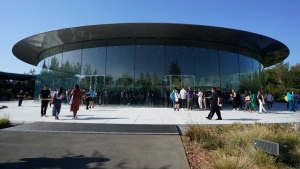 People arrive before an Apple event on the campus of Apple's headquarters in Cupertino, Calif., on Sept. 7, 2022. (Jeff Chiu / AP) 