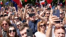 Participants join an anti-government march led by the centrist opposition party leader Donald Tusk, in Warsaw, Poland, on June 4, 2023. (Czarek Sokolowski / AP)
