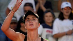 Ukraine's Elina Svitolina celebrates after beating Russia's Daria Kasatkina in their fourth round match of the French Open tennis tournament at the Roland Garros stadium in Paris, Sunday, June 4, 2023. (AP Photo/Christophe Ena)