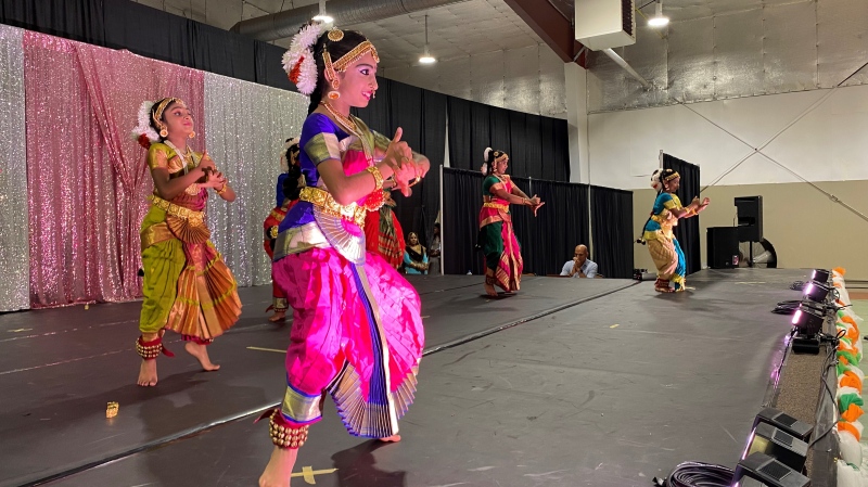 Dancers entertain the crowd at the India Pavilion as part of the Mosaic Festival. (GarethDillistone/CTVNews) 