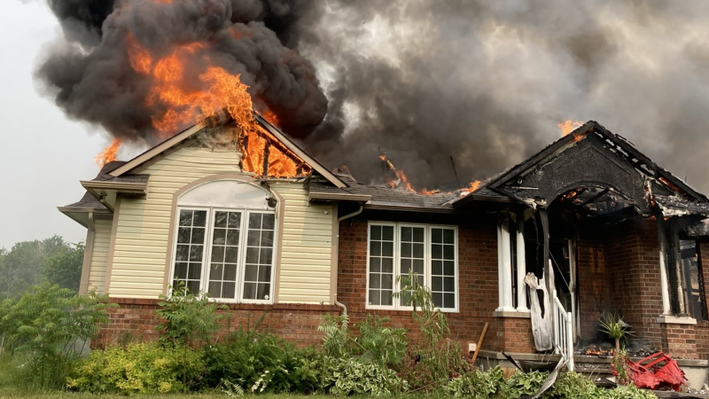 Ottawa firefighters at the scene of a house fire on Poplarwood Avenue in Stittsville. June 5, 2023. (Ottawa Fire Services)