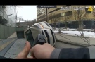 This photo taken from body cam video recorded Feb. 12, 2022, in Buffalo, N.Y., shows the hands of state trooper Anthony Nigro pointing his firearm as he approaches the overturned car of James Huber. On Monday, June 5, 2023, Nigro was charged with manslaughter for fatally shooting Huber after a high-speed car chase. (Office of the State Attorney General of New York via AP)