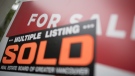 A real estate sign is pictured in Vancouver, B.C., Tuesday, June, 12, 2018. The Quebec Professional Association of Real Estate Brokers says Montreal home sales were down in May from last year but showed signs of picking up from recent lows. THE CANADIAN PRESS Jonathan Hayward