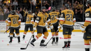 The Vegas Golden Knights celebrate after Game 2 of the NHL hockey Stanley Cup Finals against the Florida Panthers, Monday, June 5, 2023, in Las Vegas. The Golden Knights defeated the Panthers 7-2 to take a 2-0 series lead. (AP Photo/John Locher)