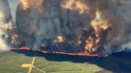 Aerial view of the Donnie Creek Wildfire is shown in this handout image provided by the BC Wildfire Service. THE CANADIAN PRESS/HO-BC Wildfire Service