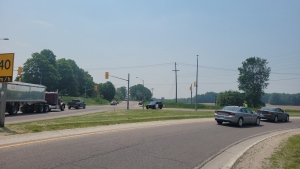 Provincial police at the scene of a collision on Simcoe Road 93 in Midland, Ont., on Tues., June 6, 2023. (Source: OPP/Twitter)