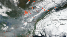 NASA satellite imagery showing haze, smoke plumes