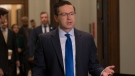 Conservative leader Pierre Poilievre speaks with reporters before the Standing Committee on Procedure and House Affairs on Parliament Hill, Tuesday, June 6, 2023 in Ottawa. THE CANADIAN PRESS/Adrian Wyld