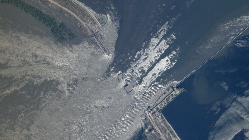 This satellite image provided by Planet Labs PBC shows an overview of the damage on the Kakhovka dam in southern Ukraine on Tuesday, June 6, 2023. (Planet Labs PBC via AP)
