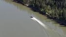 Boats and helicopters searching for the boy who went missing in the North Saskatchewan River on Sunday, June 4, 2023. (CTV News Edmonton)