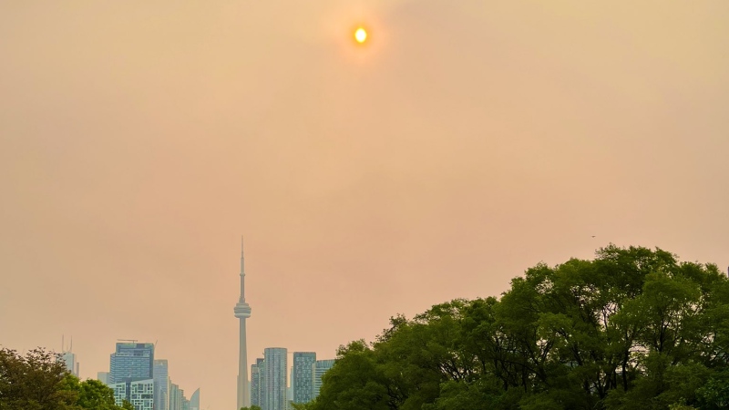 Residual smoke from wildfires in northern Ontario and Quebec is seen in the sky above Toronto on June 7, 2023. (Twitter/@jayvas)